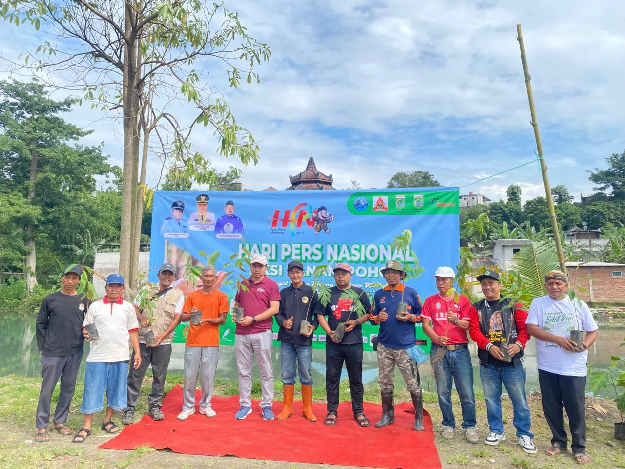 IMG-20260216-WA0035 HPN 2026 Dirayakan dengan Aksi Hijau, Sam Tito Turun Langsung Tanam 750 Bibit dan Tebar 3.000 Nila di Sungai Wendit